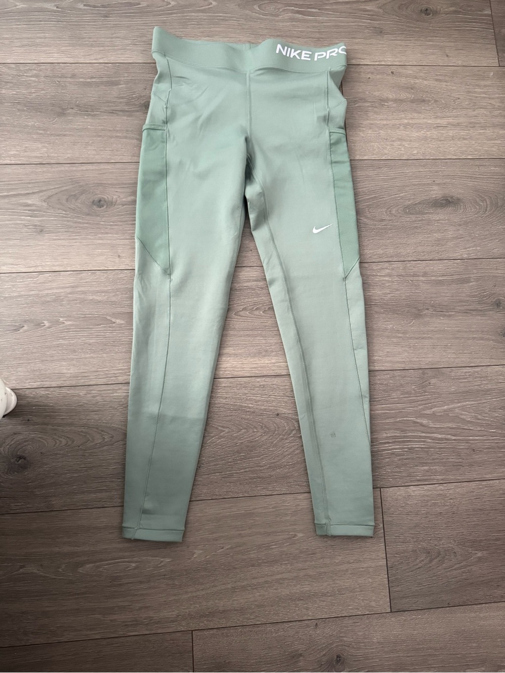 Mint green crop nike leggings